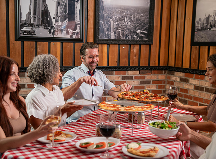 A family enjoying a Grimaldi's meal