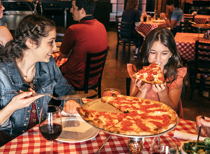 Kids enjoying Grimaldi's pizza
